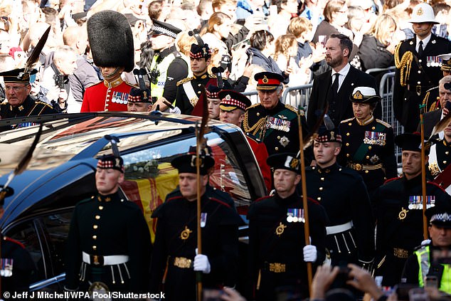 A man heckles at Prince Andrew as he walked behind the late Queen's coffin in Edinburgh in 2022