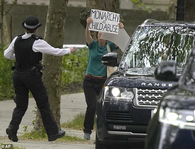 A police officer rushed to the protester outside the Foundling Museum ahead of Kate's visit last year