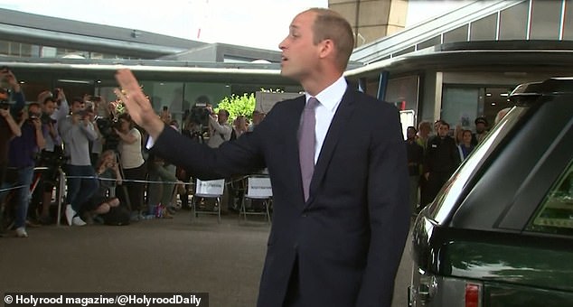 Prince William speaks to the public near the site of Grenfell Tower in 2017