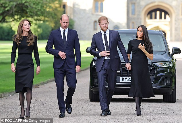 Princess Catherine and Prince William do an awkward looking walkabout with Prince Harry and Meghan at Windsor Castle following the death of the Queen on September 10, 2022