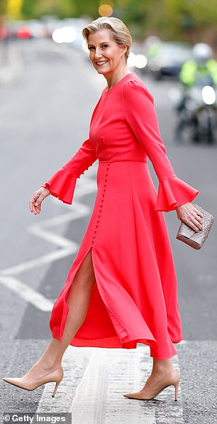 In April, Sophie caught attention in a bright coral dress from Beulah