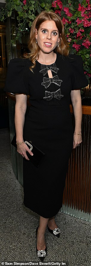 Beatrice oozed glamour in a Rebecca Vallance bow-embellished dress and Roger Vivier heels