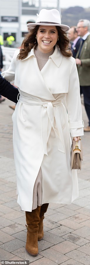 At Cheltenham Festival, Eugenie wrapped up in a camel knitted dress and off-white trench coat, both by Reiss