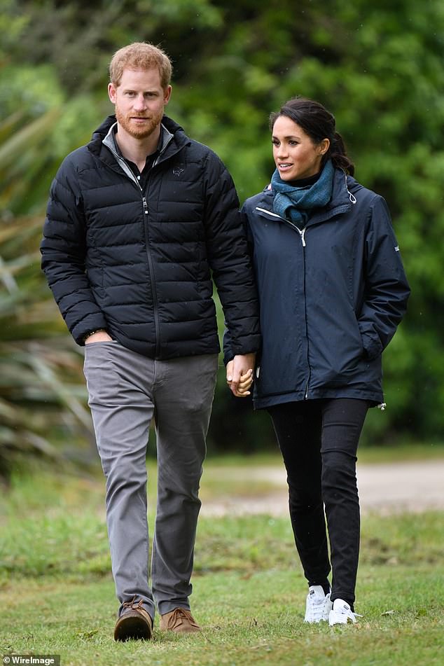 Following Harry's decision to step down from royal duties with Meghan in 2020 and move to California he has lost touch with many of his old friends. Pictured: Harry and Meghan on a walk in October 29, 2018