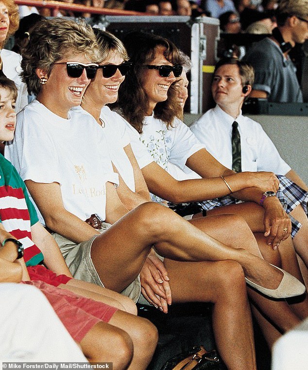 Princess Diana and Victoria Mendham (on her left) laugh together while watching a performance of The Indiana Jones Adventure at MGM Studios in Walt Disney World