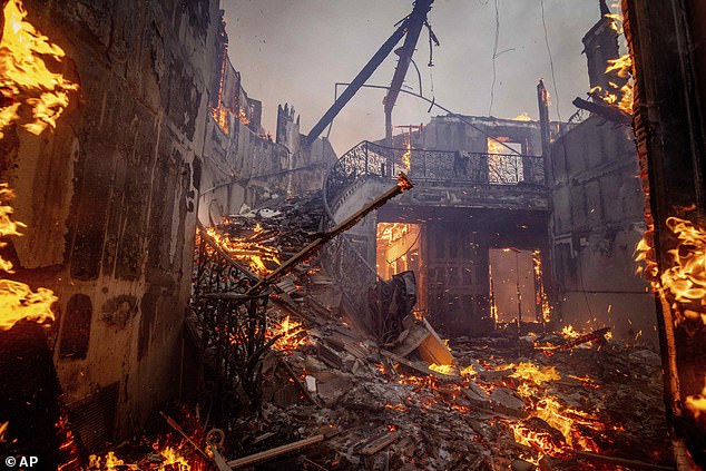 The Palisades Fire burns a property in the Pacific Palisades neighbourhood of Los Angeles