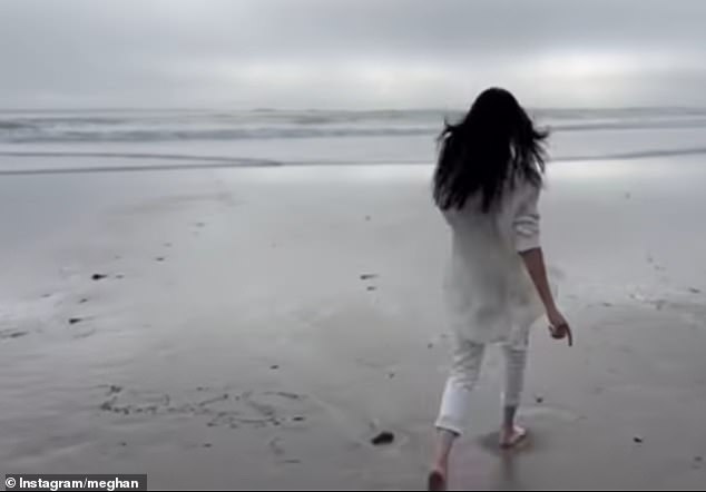 Eagle-eyed fans spotted that Meghan had previously filmed the video, as they noticed another attempt to write 2025 in the sand (left)