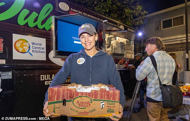 They are there to feed California fire victims and anyone else who come from a food truck owned by Greg Dolan, owner of Dulan's Soul Food Restaurant and Catering Co., at the temporarily shut down Jack in the Box in the city of Altadena