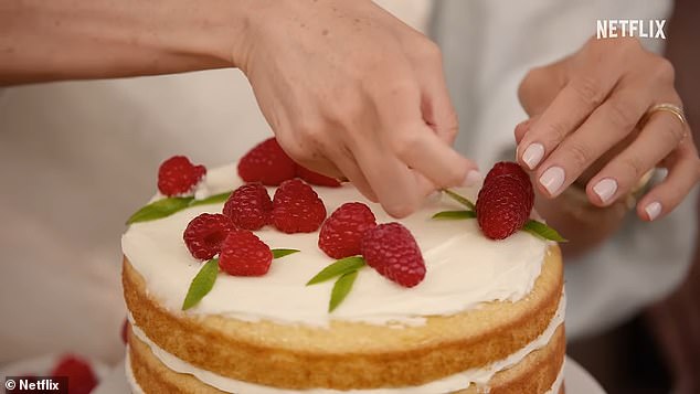 Among Meghan's dishes is a multi-layered Victoria sponge cake, garnished with fresh raspberries and cream