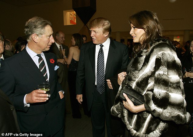 Charles talks with Donald and Melania Trump during a reception at the Museum of Modern Art in New York in November 2005