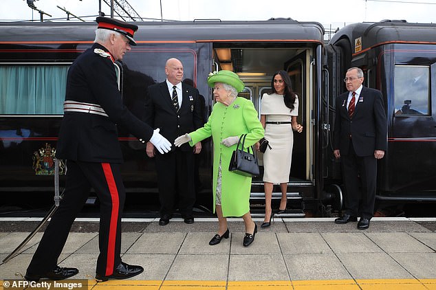 Queen Elizabeth II arriving with the Duchess of Sussex by Royal Train at Runcorn Station to carry out engagements in Cheshire