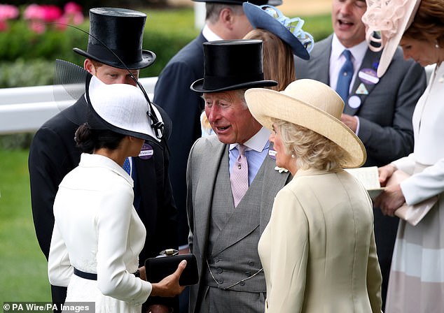 Meghan and Harry chat to Charles and Camilla at Royal Ascot in 2018