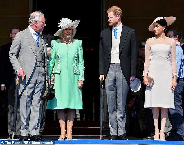 Charles and Camilla alongside the newly-created Duke and Duchess of Sussex at Buckingham Palace on May 22, 2018