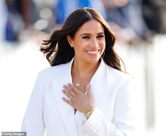 The Duchess also wore a gold hand chain from Catbird at the Invictus Games. The chain is called the "Kitten Mitten" and is a finger bracelet style and went beautifully with the ring