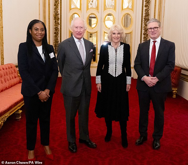 King Charles III and Queen Camilla pictured with Conservative Party leader Kemi Badenoch and Prime Minister Sir Keir Starmer