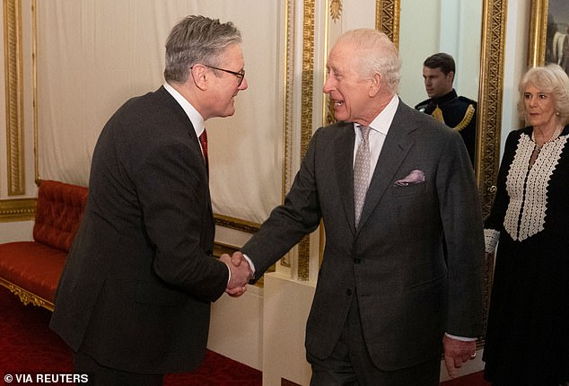 Sir Keir Starmer shakes hands with King Charles at the reception on Wednesday