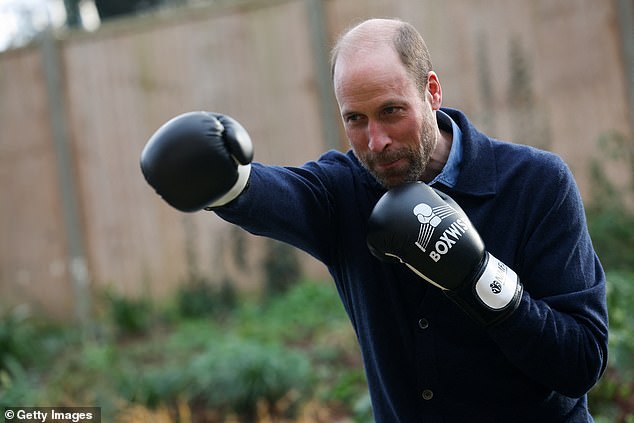 Prince William wore a pair of boxing gloves during his visit to Centrepoint, a charity which supports homeless youth, in west London on Tuesday, January 21