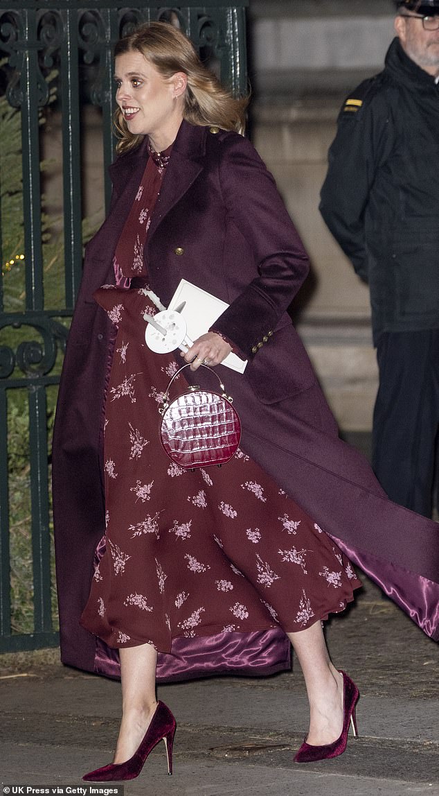 At the carol concert, Beatrice opted for a flowing silk floral dress by ME+EM, featuring delicate ruffled trims and a charming print