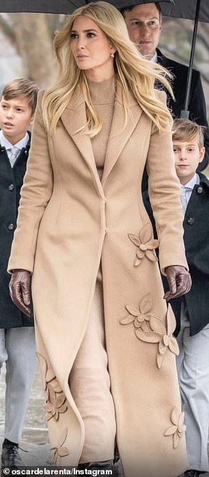 At a wreath-laying ceremony, Ivanka opted for an Oscar de la Renta coat adorned with 3D floral appliqués, paired with a mock turtleneck dress, leather boots and gloves