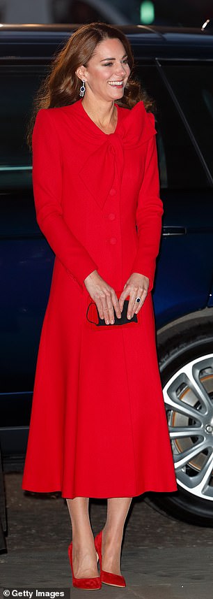 For the 2021 Christmas carol service, Kate showcased her penchant for literal dressing in Catherine Walker's standout Beau Tie coat dress