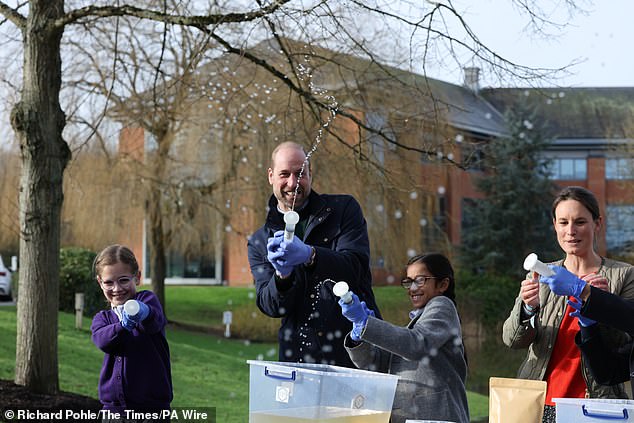 William, 42, appeared to be in high spirits as he and local school children in Guildford filtered DNA samples through a syringe after extracting water from a local pond