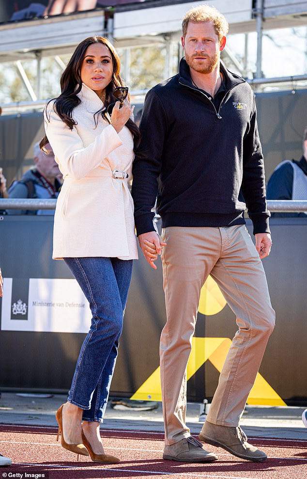 Meghan Markle and Prince Harry are pictured at the Invictus Games in the Netherlands in 2022