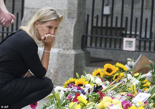 Sophie looks at the flowers placed outside Balmoral Castle on September 10, 2022, two days after Queen Elizabeth II died at the age of 96