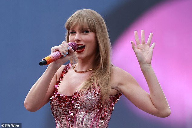 Taylor Swift performing on stage at the Aviva Stadium in Dublin, during the Eras Tour