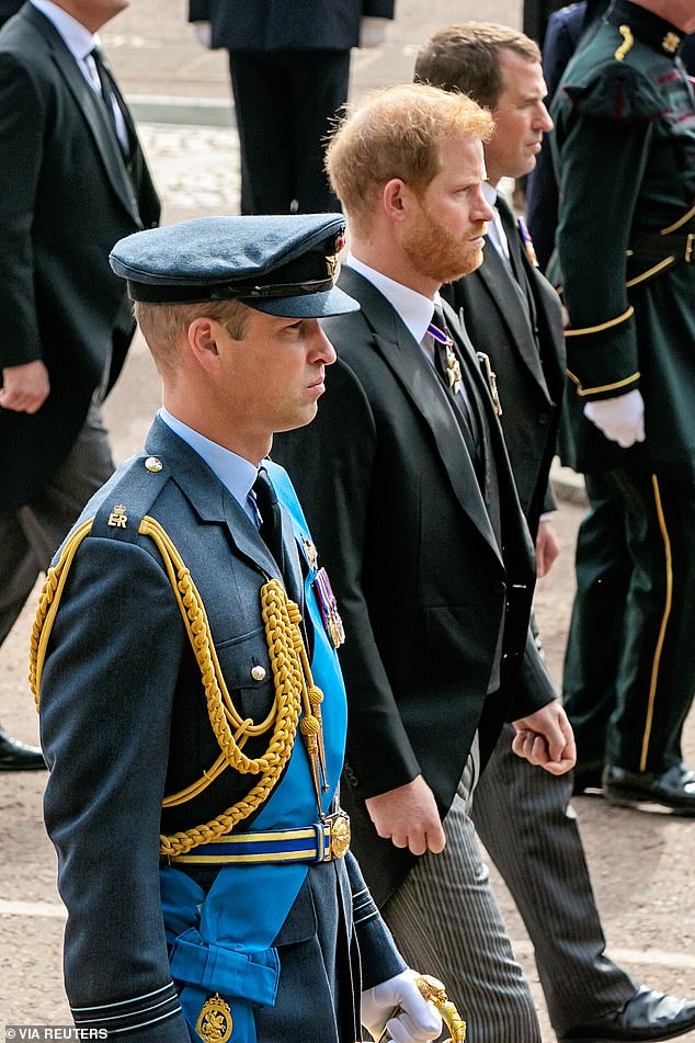 The Queen's Funeral Procession passes Buckingham Palace, with William, Prince of Wales and Prince Harry, Duke of Sussex in 2022