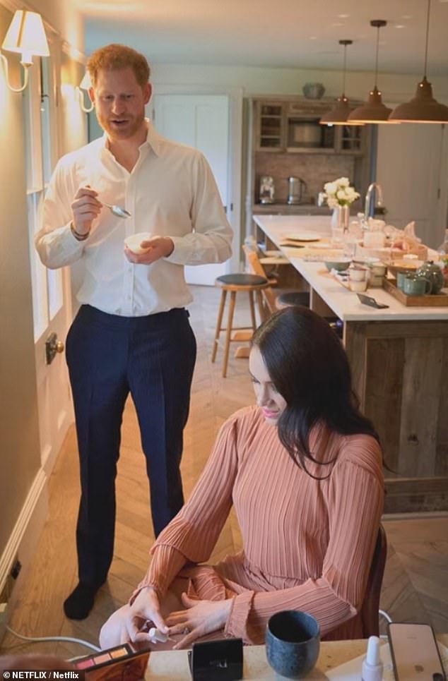 Prince Harry and Meghan Markle in Frogmore Cottage shown in a clip from their Netflix series