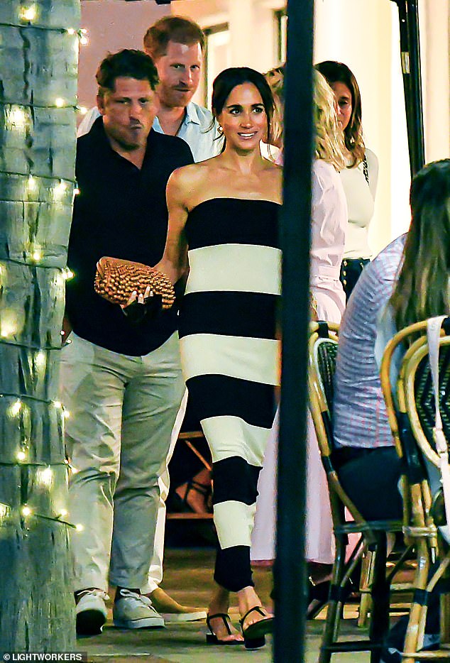 Meghan Markle's support for Australian womenswear brand Posse has been 'monumental', the owner said (Meghan is seen wearing the £240 Posse Theo Striped Maxi Dress outside Tre Lune in 2023