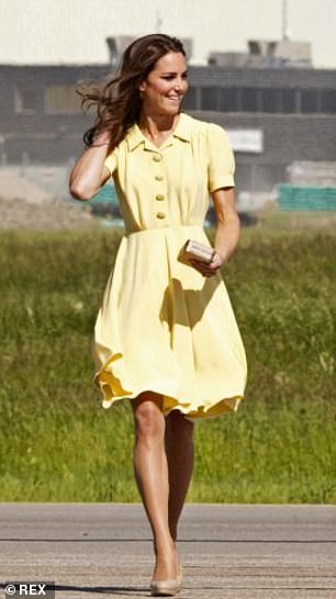 Arriving in Calgary in 20ll wearing a pastel yellow       Jenny packham dress