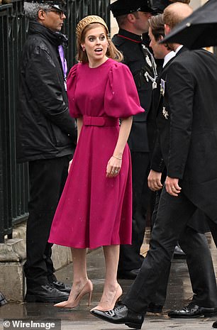 For the King's Coronation Beatrice wore a Beulah London magenta dress in 2023