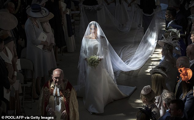 Meghan walked the first part of the aisle by herself as her father was too sick to travel and then the King met her halfway and walked her to the altar