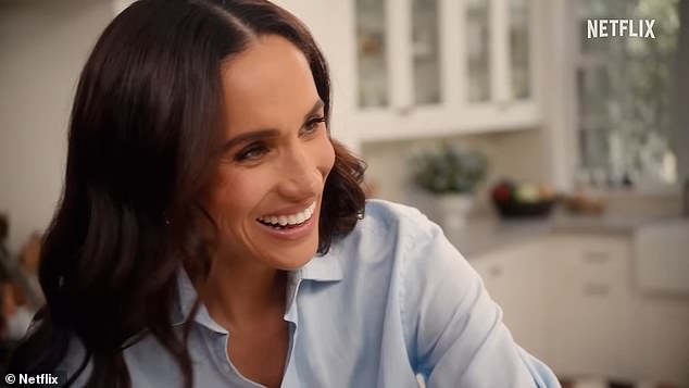 Meghan embraces laid back Californian style in the trailer, where she's pictured wearing loose, chic shirts