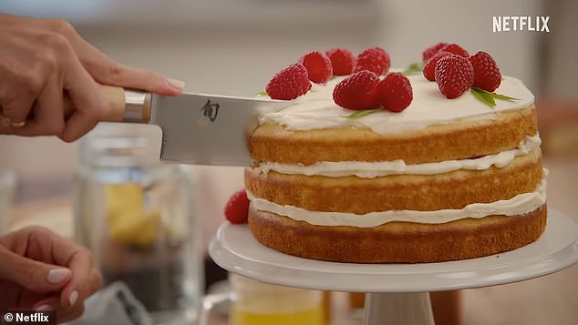 Among Meghan's dishes is a multi-layered Victoria sponge cake, garnished with fresh raspberries and cream