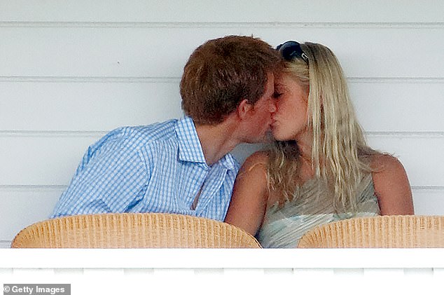 Prince Harry kissing Chelsy Davy in the Royal Box during a match at Guards Polo Club in July 2006