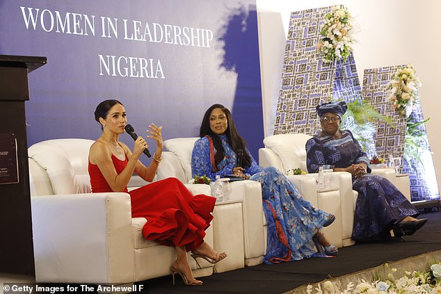 Meghan wore a vibrant red ruffled dress by Oríré to speak at a Women in Leadership event during her 2024 Nigeria tour. Letting her frock stand out, the royal accessorised with her £565 So Nude sandals