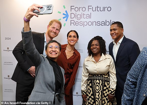 Meghan and Harry (extreme left) at the 'Responsible Digital Future' forum at EAN University in Bogota, Colombia