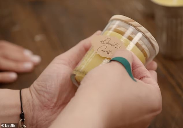 The Duchess of Sussex , 43, can be seen writing labels for homemade candles, which could possibly be for her lifestyle brand American Riviera Orchard which she launched in 2024, in a teaser clip for her eight-episode series 'With Love, Meghan'