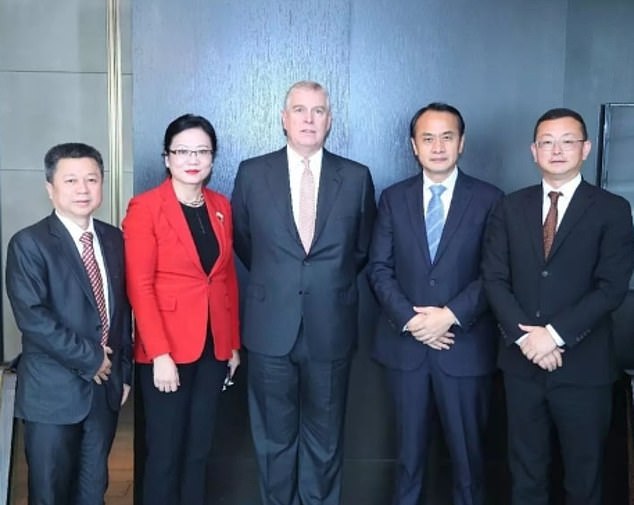 Yang Tengbo (far right) with Andrew at an event to encourage trade between China and Britain