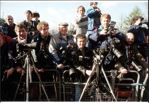 A pack of photographers at Marina and Paul's wedding in February 1990