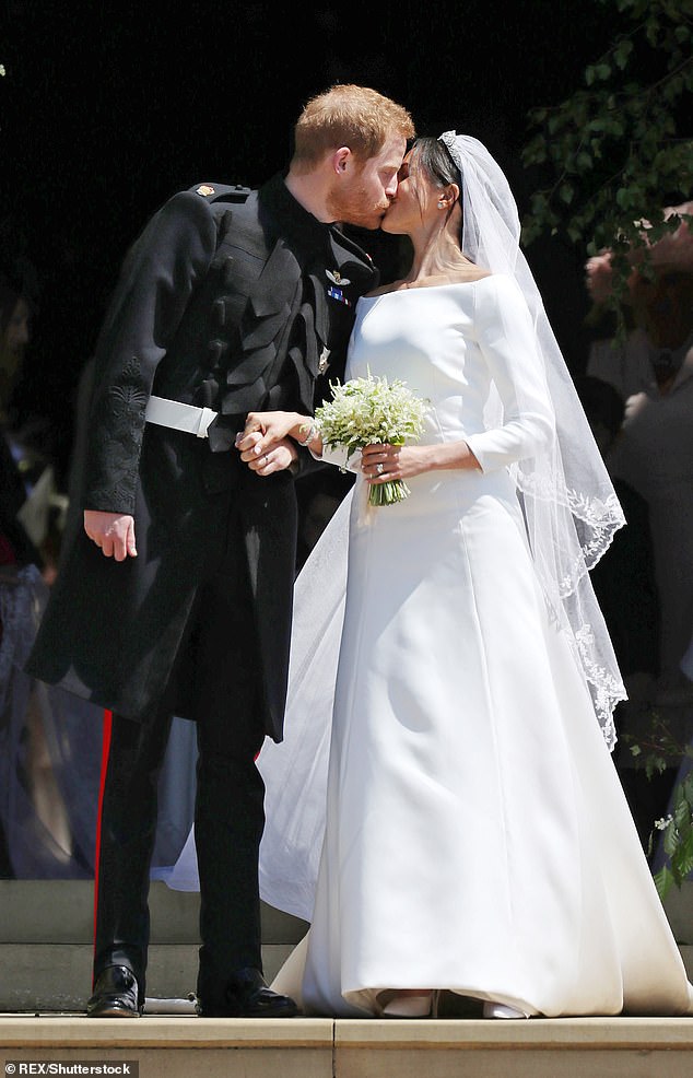 Prince Harry and Meghan Markle kiss at their wedding in St George's Chapel, Windsor Castle, on May 19, 2018