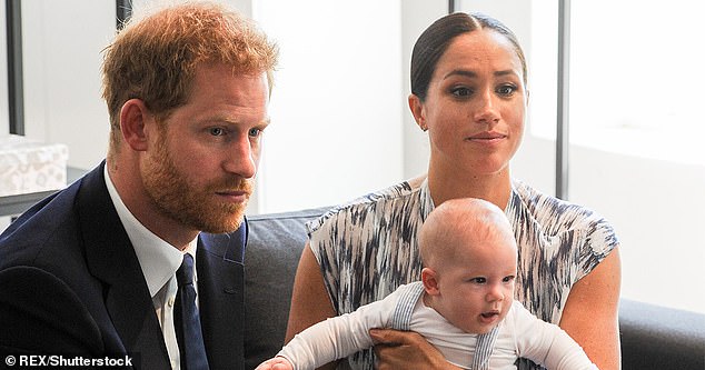 Meghan, Harry and their son Archie in September 2019 on a visit to Africa