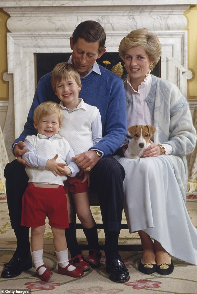 Prince Charles and Princess Diana with their children at home in Kensington Palace in December 1986