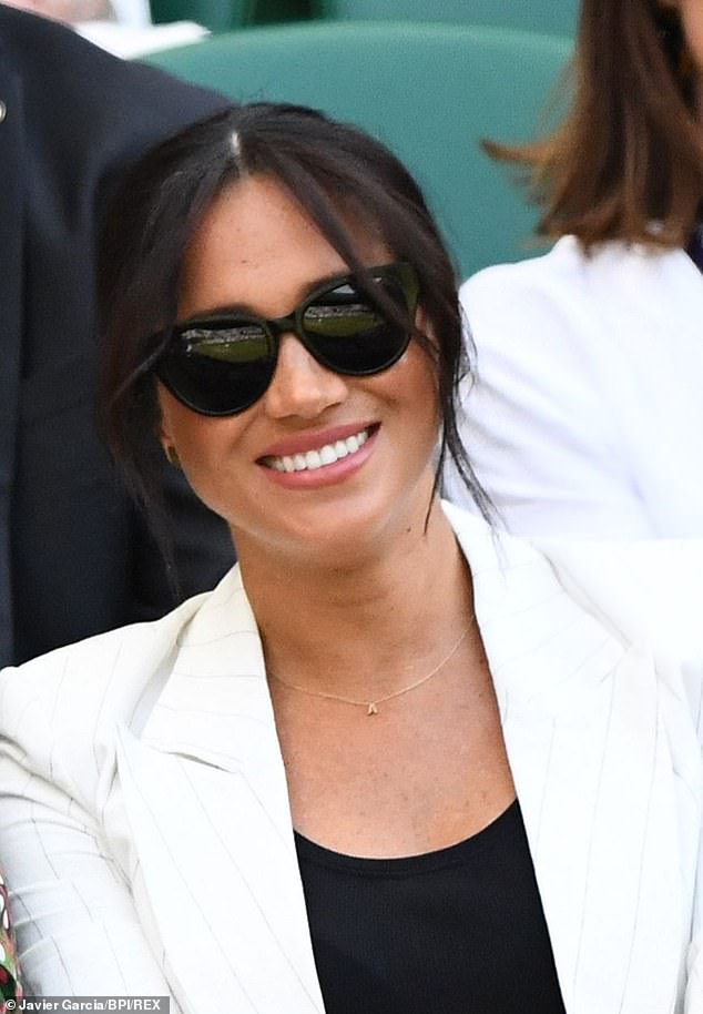 Shortly after the birth of her son, Archie, Meghan was spotted wearing a £391 gold initial necklace at a Wimbledon match