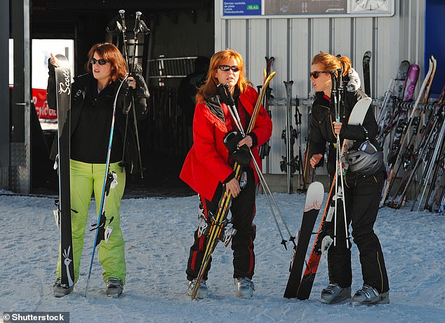 Sarah Ferguson Duchess of York with her daughters Princess Beatrice and Princess Eugenie on the slopes in Verbier in February 2011