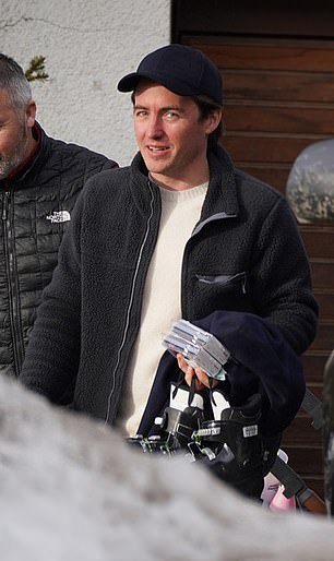 Her husband, property developer Edoardo Mapelli Mozzi, was also spotted carrying ski boots as he walked through the resort