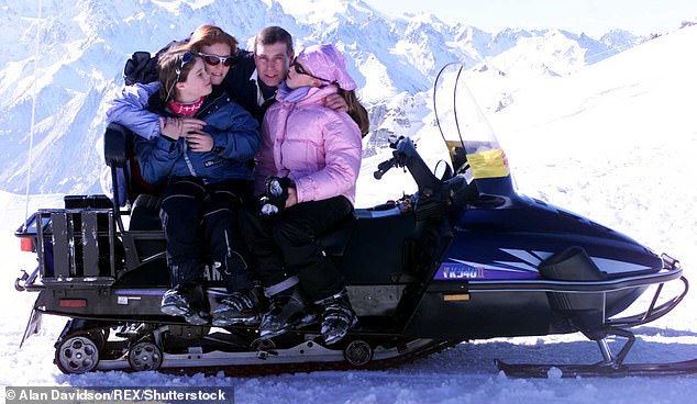 Andrew pictured with his daughters and the Duchess of York on the Slopes of Verbier in February 18, 2001