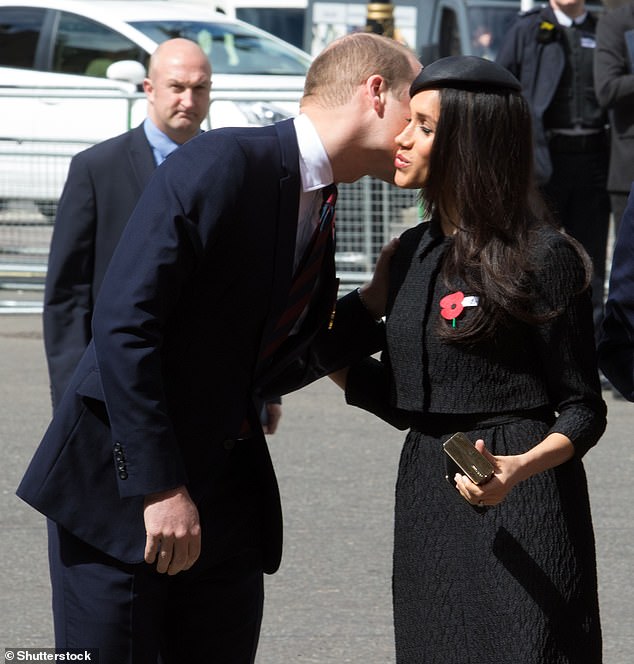 The book by Tom Quinn also suggested the American former actress' tactile manner made the heir to the British throne 'uncomfortable'. Picture, Prince William and Meghan greeting one another in April 2018